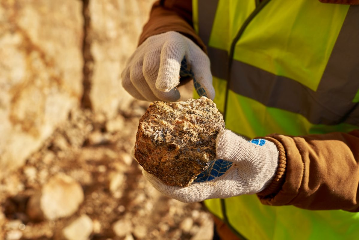 Miner Holding Chunk of Mineral Miner Holding Chunk of Mineral