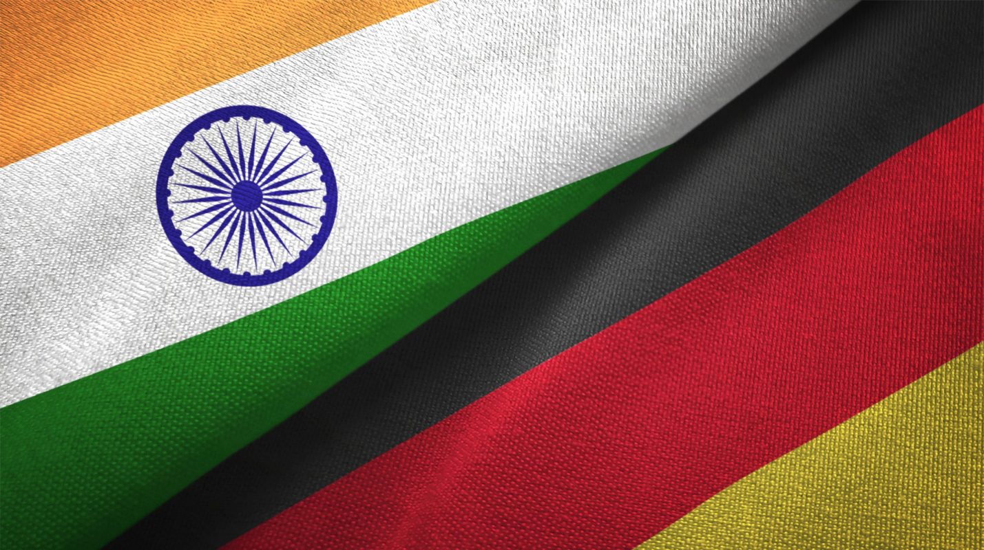 Germany and India two flags together textile cloth fabric texture The-german-und-the-indian-flag