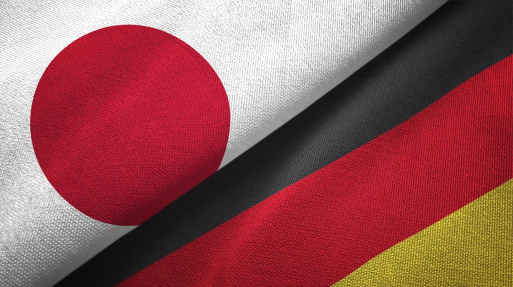 Japanese-and-German-flag-made-of-textiles-over-each-other-Japanese-German-cooperation